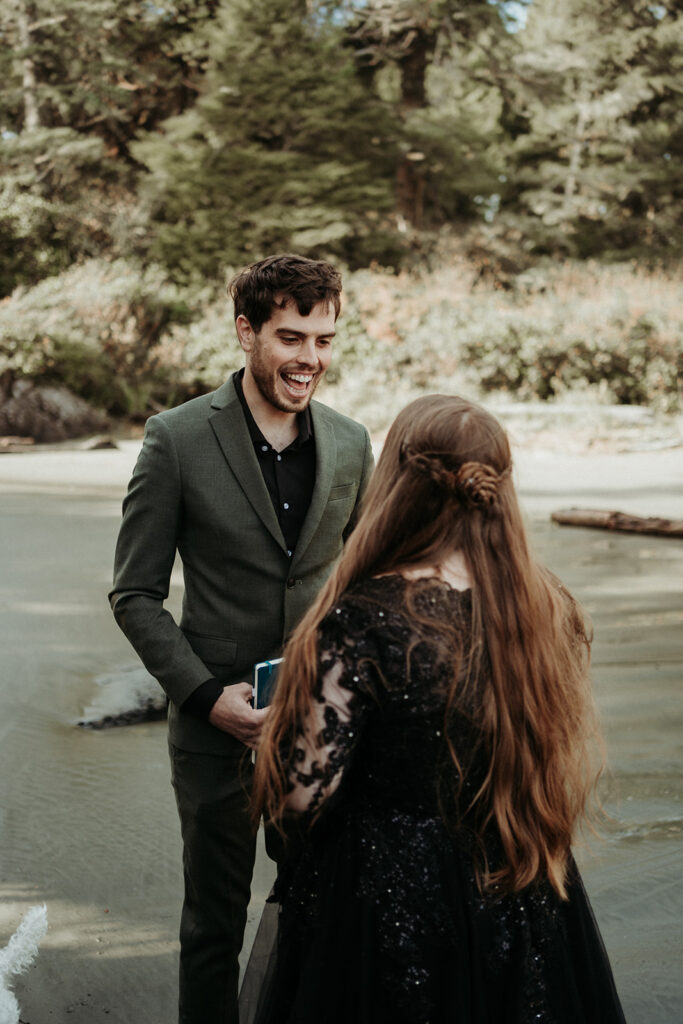 couple posing for their elopement photos in tofino vancouver island