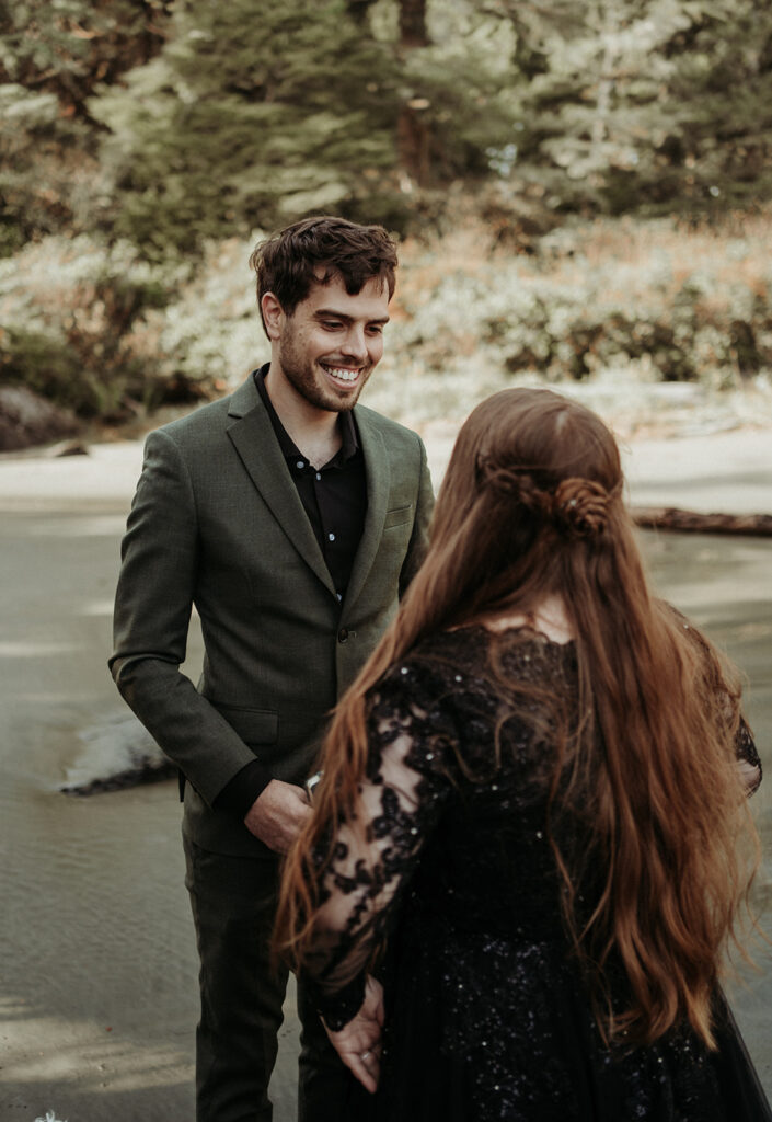 couple posing for their elopement photos in tofino vancouver island