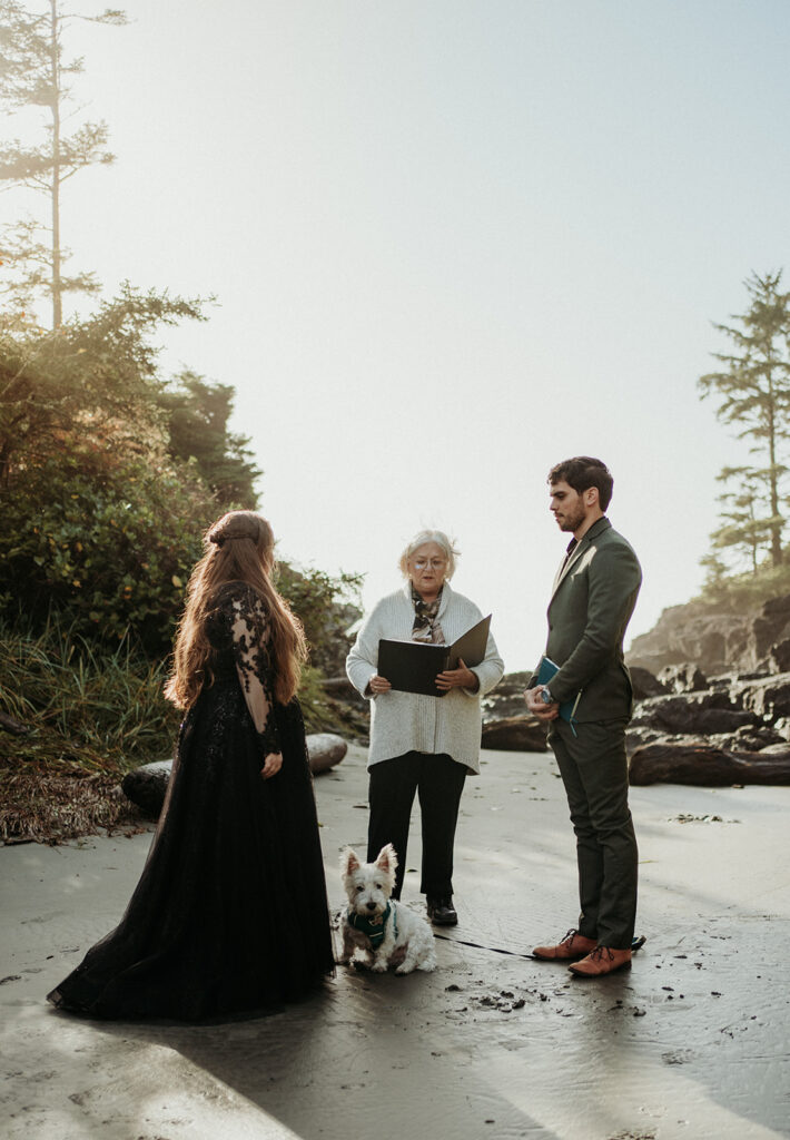 couple posing for photos in tofino vancouver island