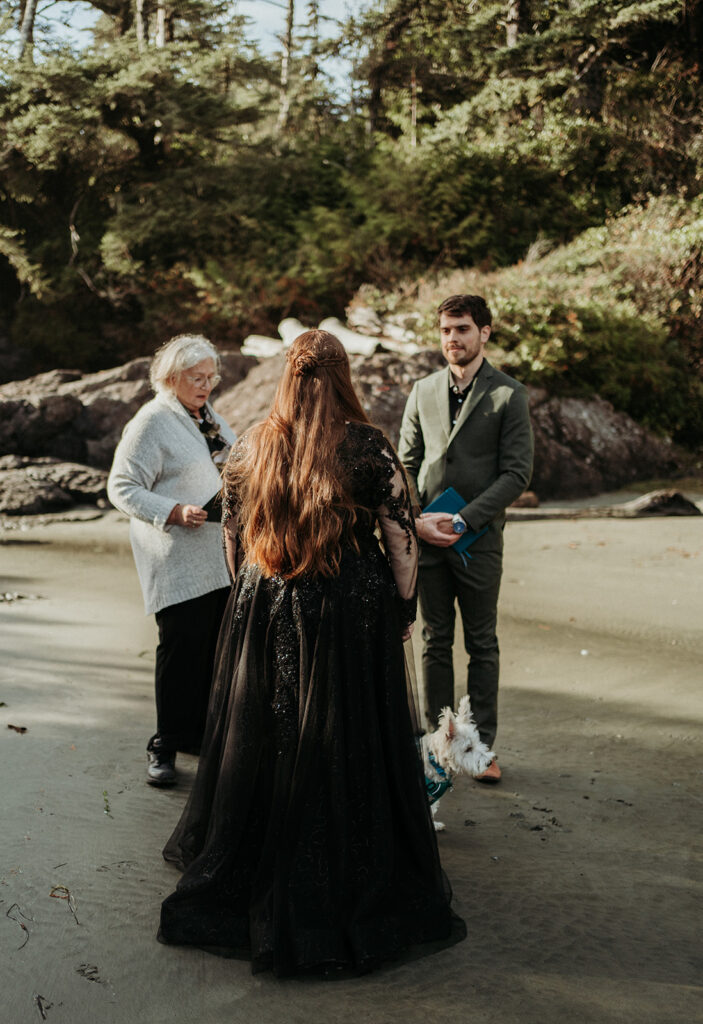 couple posing for their elopement photos in tofino vancouver island