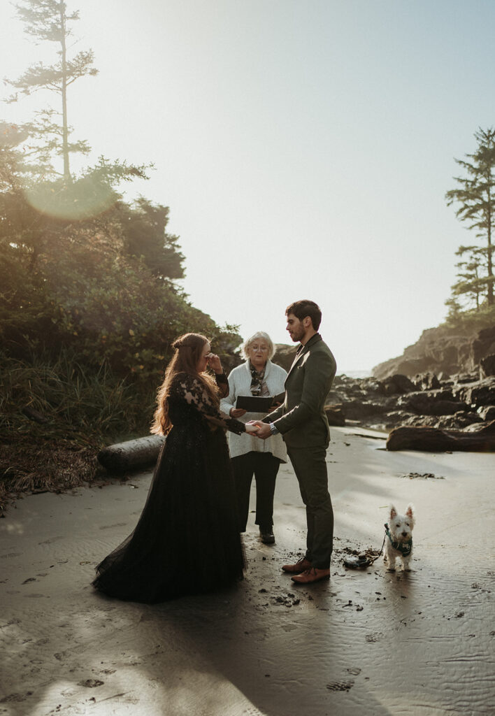 couple posing for photos in tofino vancouver island