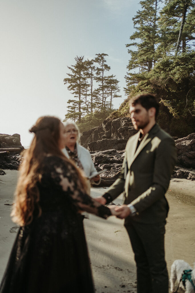 couple posing for photos in tofino vancouver island