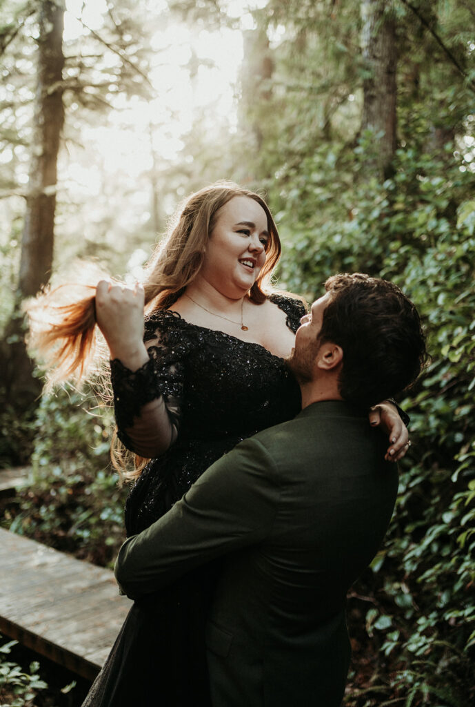 couple posing for photos in tofino vancouver island