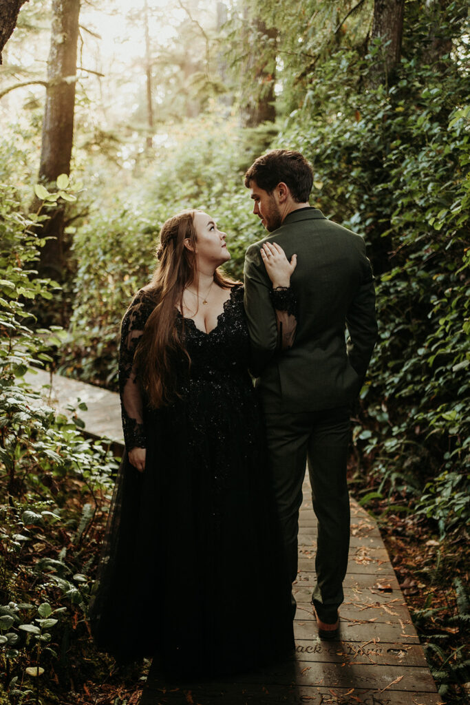 couple posing for their elopement photos in tofino vancouver island