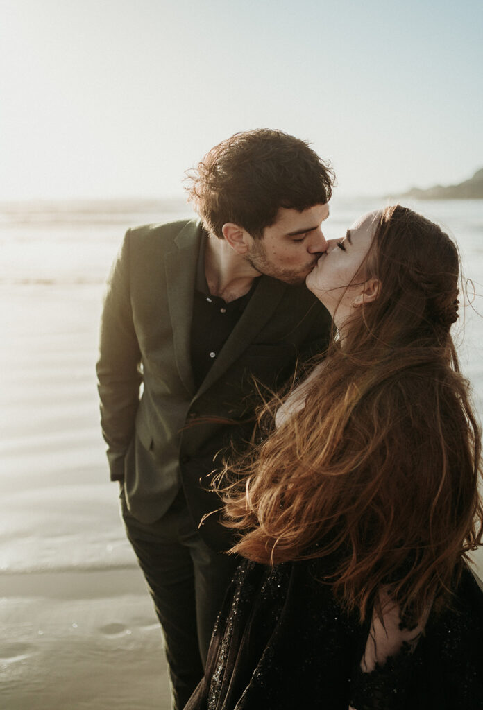 couple posing for their elopement photos in tofino vancouver island