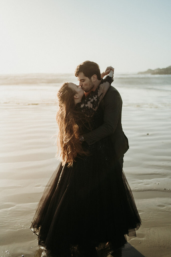 couple posing for their elopement photos in tofino vancouver island