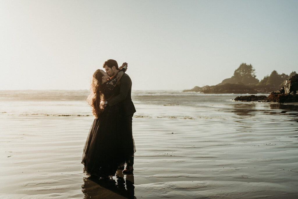 couple posing for their elopement photos in tofino vancouver island