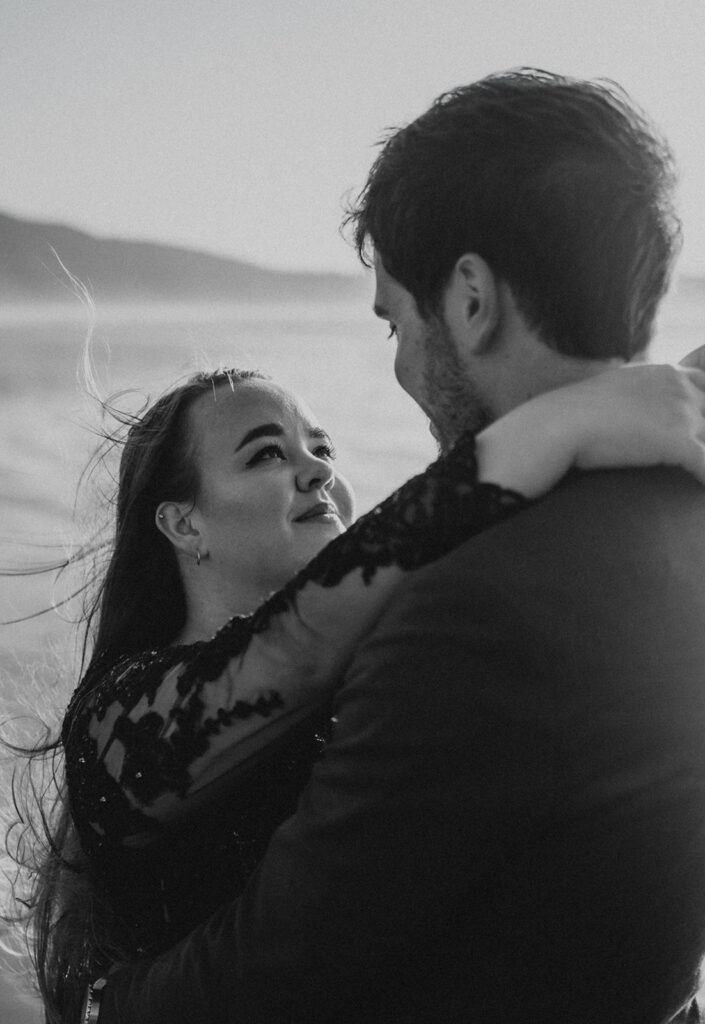 couple posing for their elopement photos in tofino vancouver island