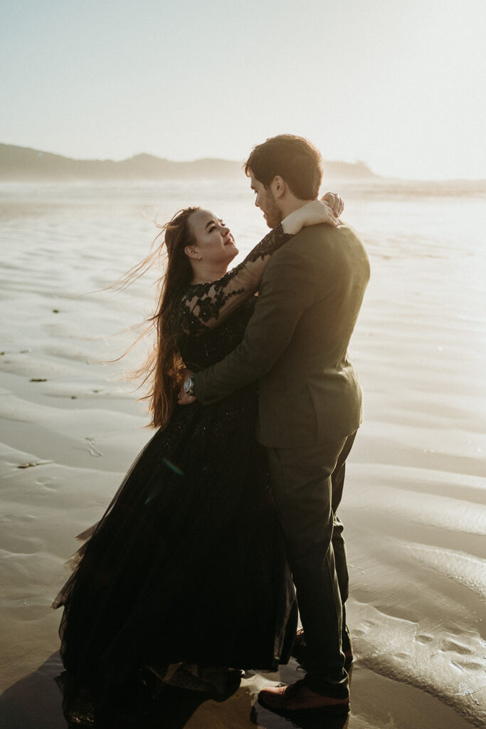 couple posing for their elopement photos in tofino vancouver island