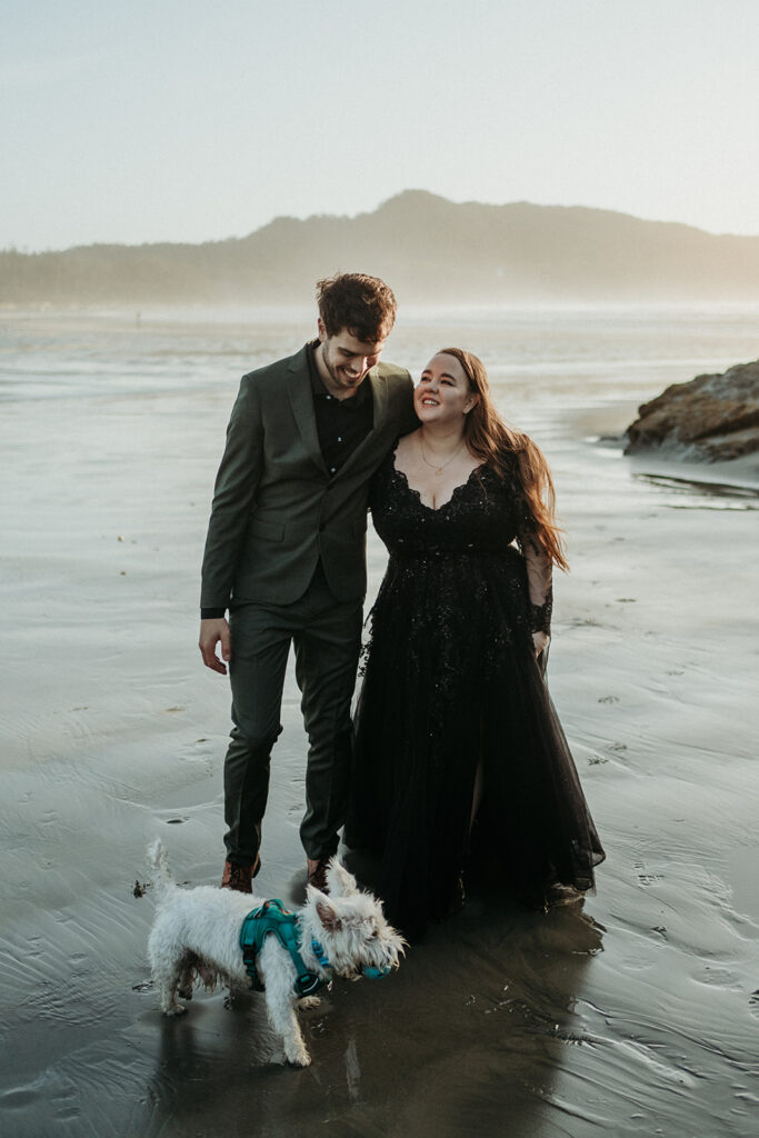 couple posing for their elopement photos in tofino vancouver island