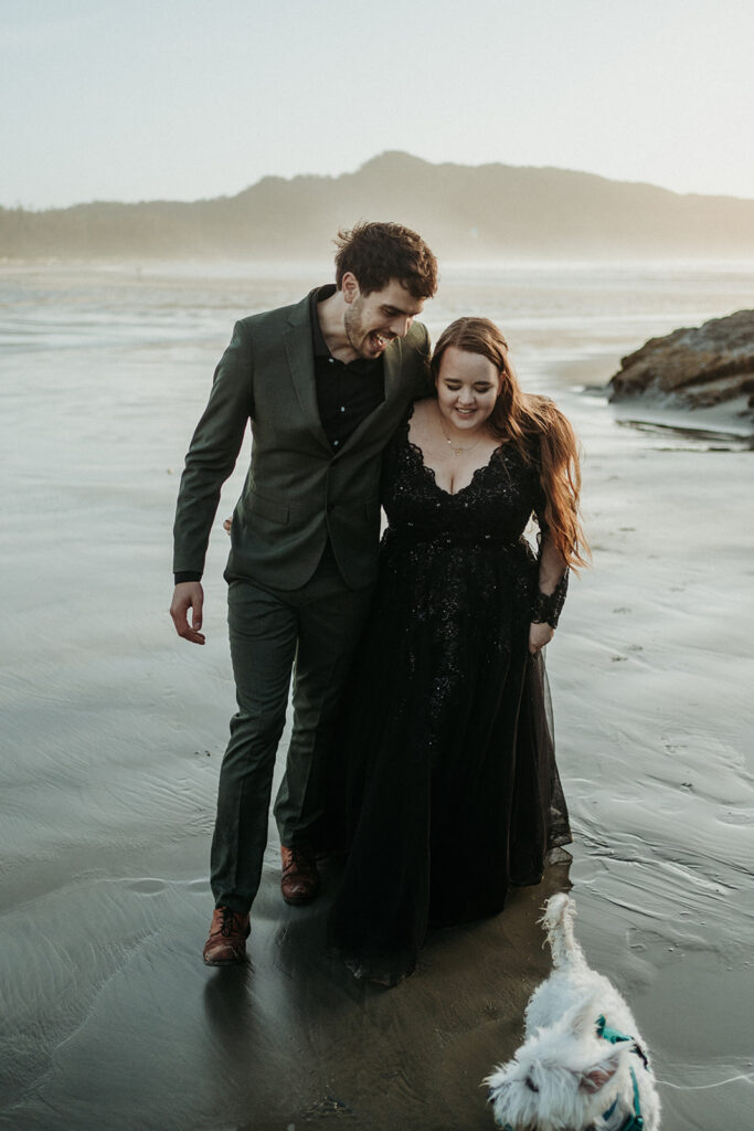 couple posing for their elopement photos in tofino vancouver island