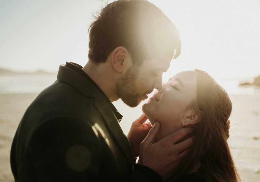 couple posing for photos in tofino vancouver island