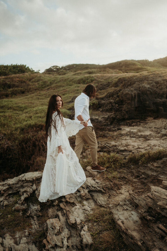 couple posing for their wedding portraits