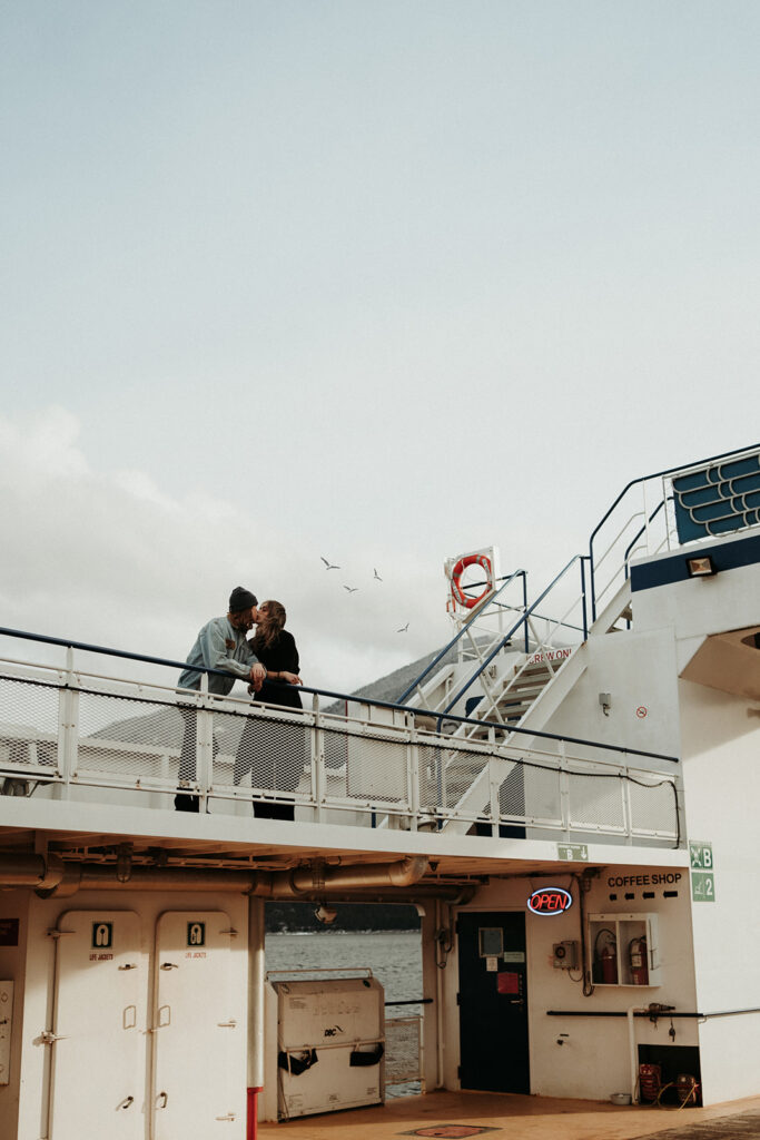 couple posing for their engagement photos on vancouver island