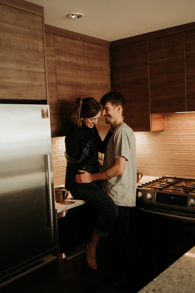 couple posing for their cozy engagement photos