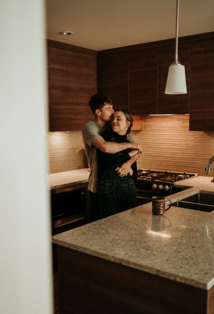 couple posing for their cozy engagement photos