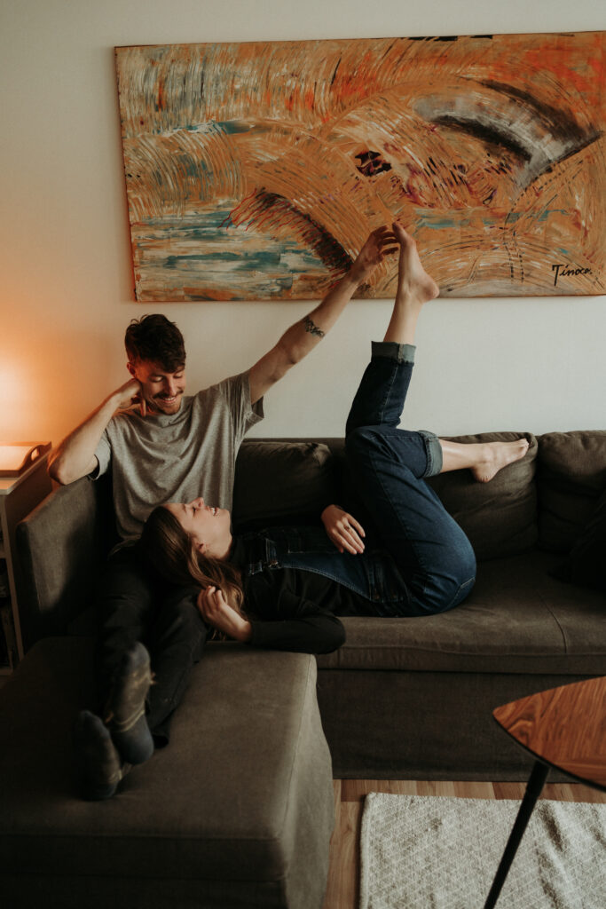 couple posing for their cozy engagement photos