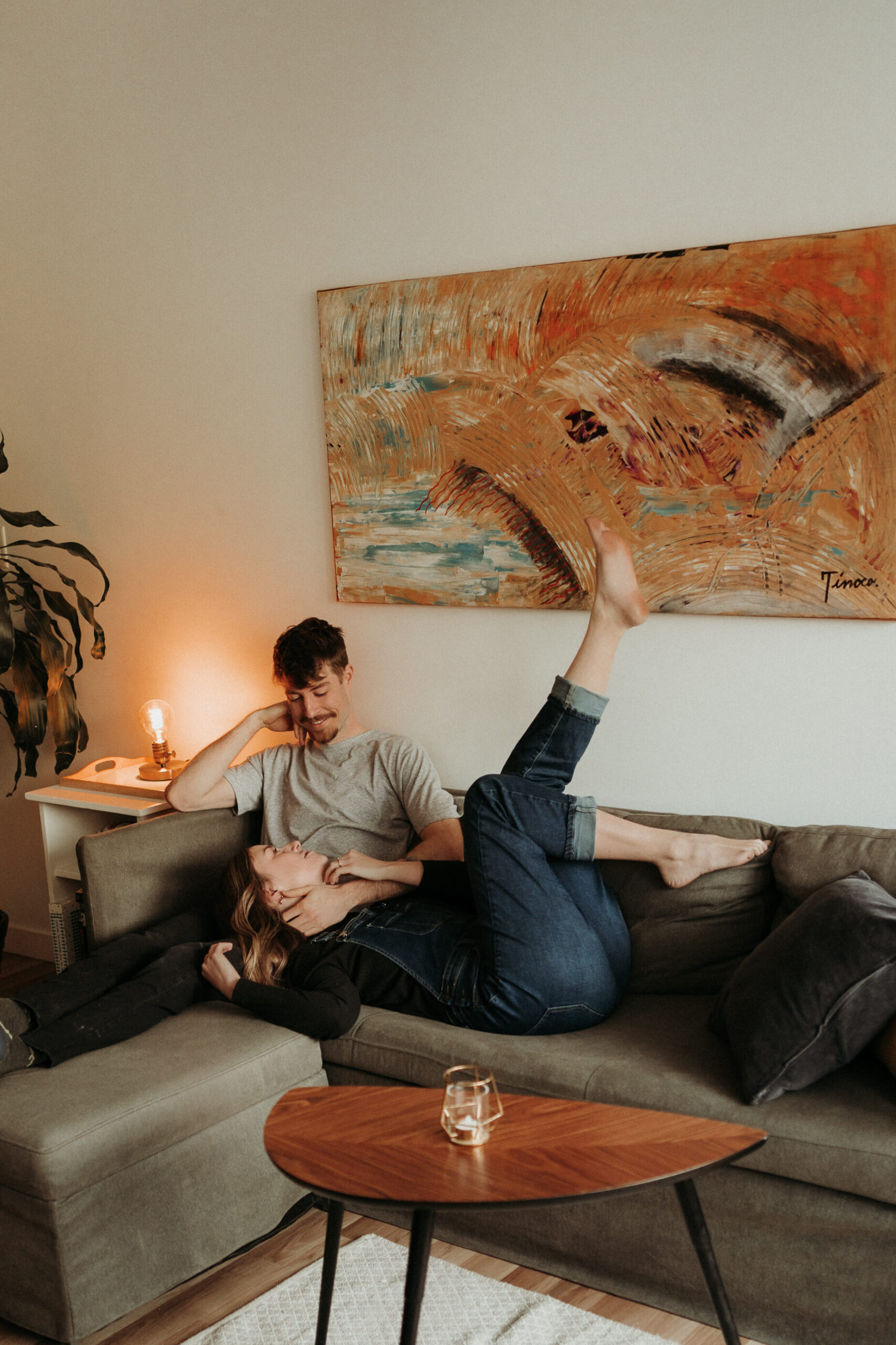 couple posing for their cozy engagement photos