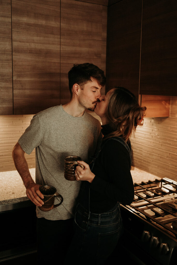 couple posing for their cozy engagement photos | At Home Engagement Photos