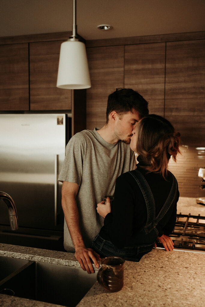 couple posing for their cozy engagement photos
