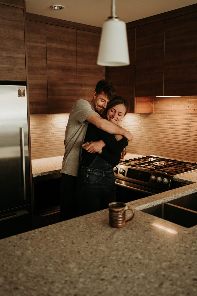 couple posing for their cozy engagement photos
