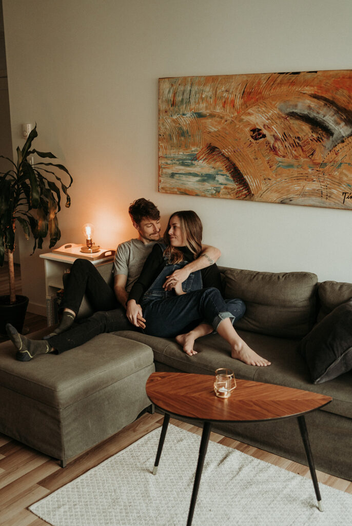 couple posing for their cozy engagement photos
