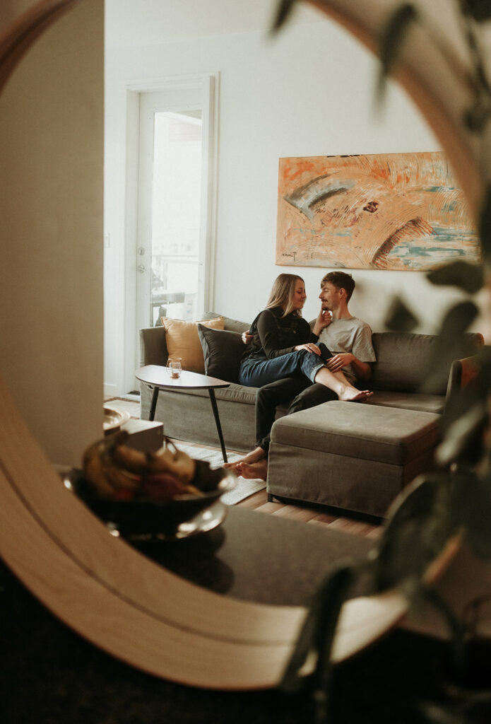 couple posing for their cozy engagement photos
