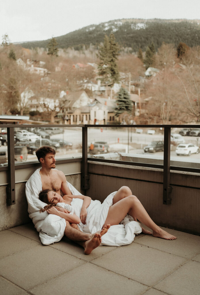 couple posing for their cozy engagement photos
