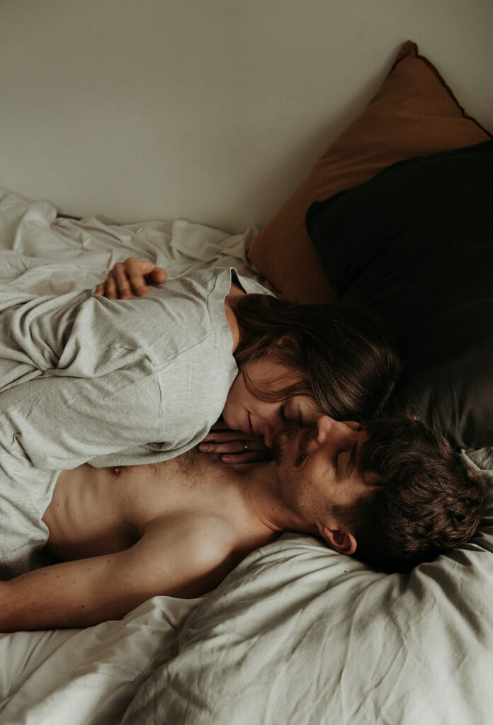 couple in bed during intimate at Home Engagement Photos