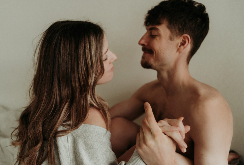 couple posing for their cozy engagement photos
