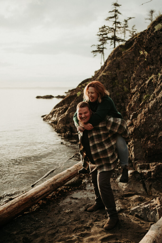 couple posing for their engagement photos on vancouver island